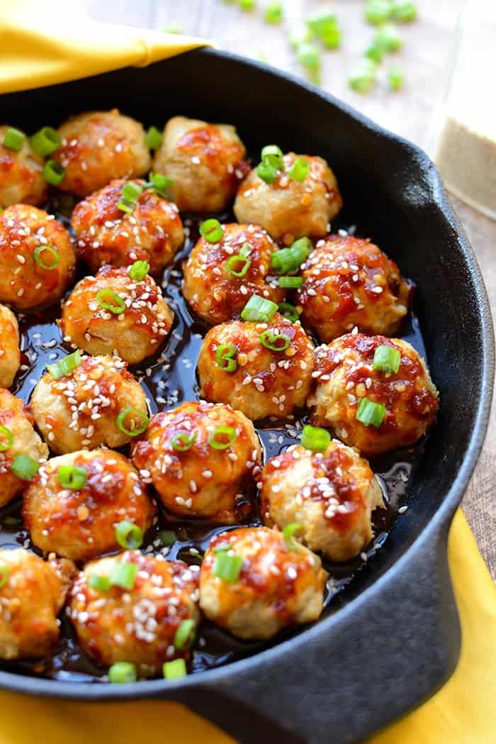 Add some zing to your chicken meatballs and make a homemade kung pao sauce with 100% clean eating ingredients! Everyone will love these Kung Pao Baked Chicken Meatballs either as an appetizer or served over white sticky rice with a vegetable. Kung Pao Chicken Meatballs