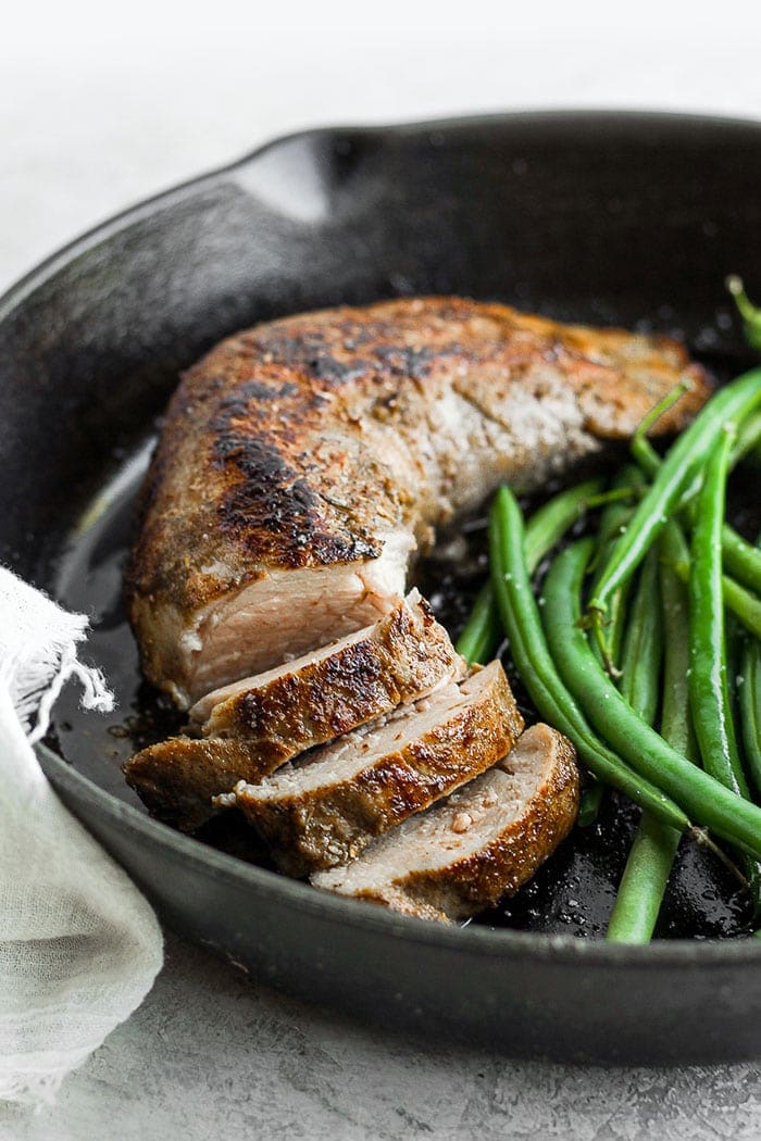 This Sous Vide Pork Tenderloin is flavorful, extremely tender, and perfectly cooked every time. Learn how to season and sous vide a pork tenderloin in no time with this simple tutorial. Pork tenderloin in cast iron.