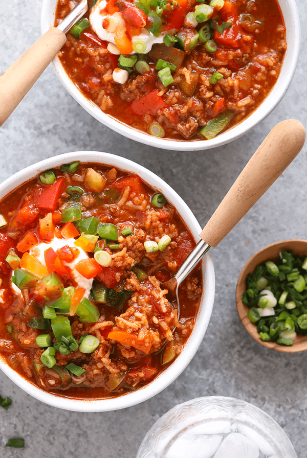 Stuffed pepper soup topped with sour cream and green onions.