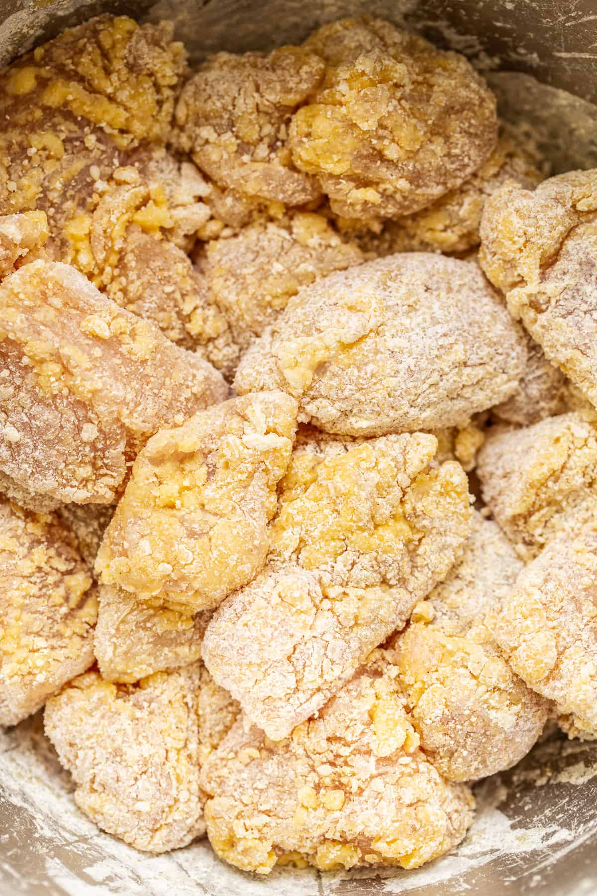 You will love this air fryer honey sesame chicken recipe. It's made with lean chicken breast and a yummy honey sesame sauce and then air-fried to make the chicken super crispy without deep frying. chicken in cornstarch