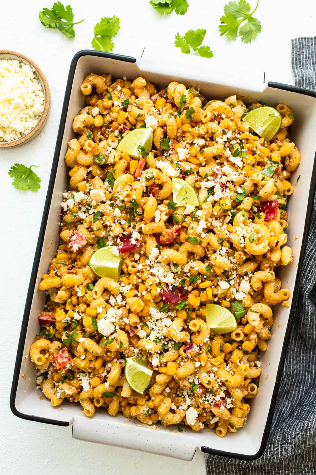 If you love Mexican Street Corn Salad then you are going to swoon over this delicious Street Corn Pasta Salad! street corn pasta salad in container.