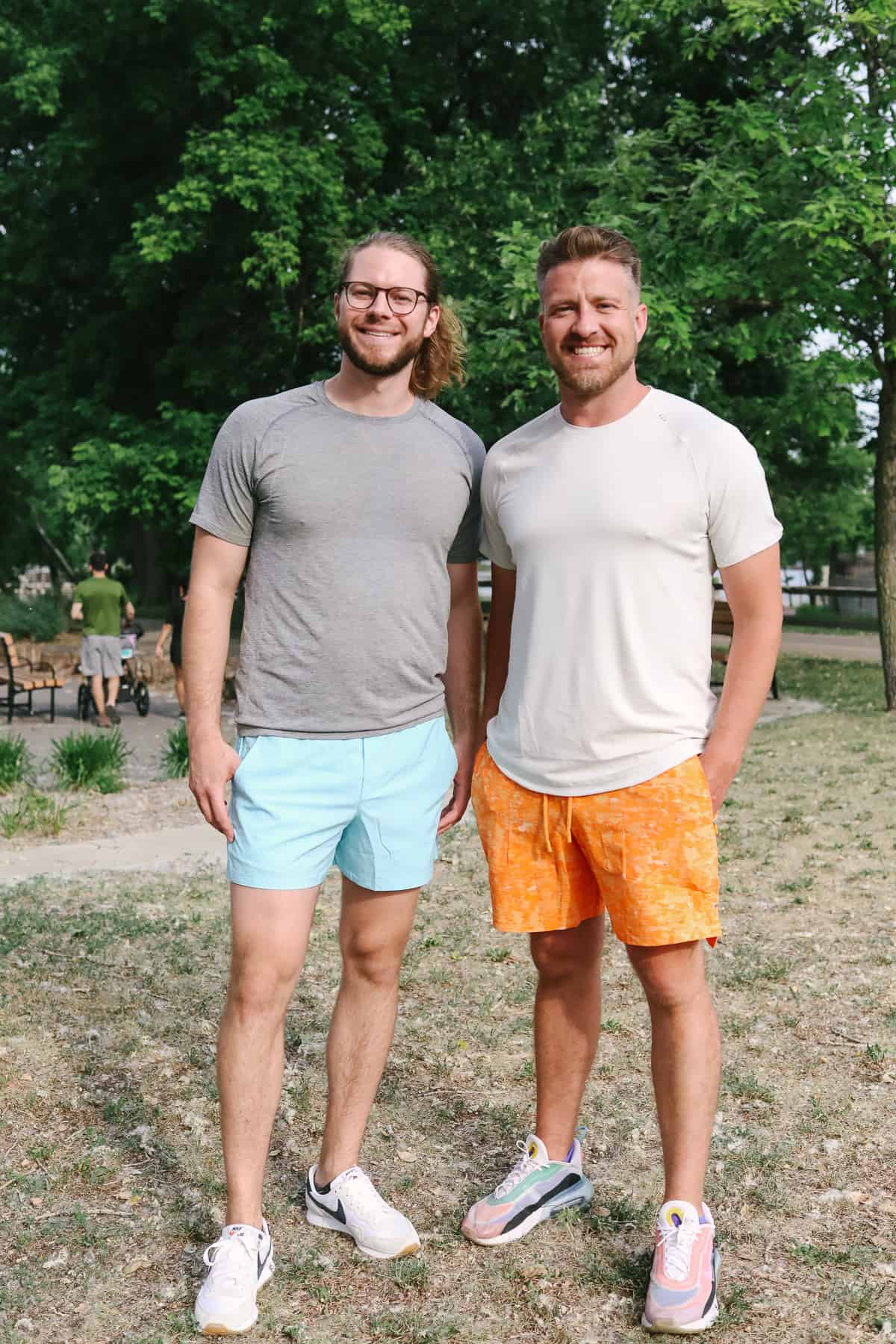 We’ve tested every pair of lululemon mens shorts (for a variety of workouts and casual wear!), and rounded up all our favorites. a couple of men standing next to each other.