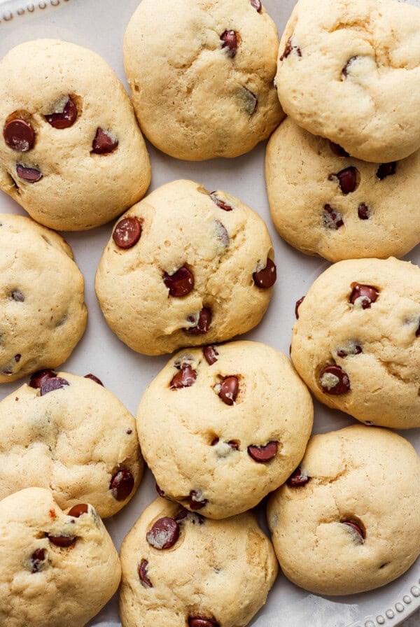 Cranberry chocolate chip cookies on a white plate.