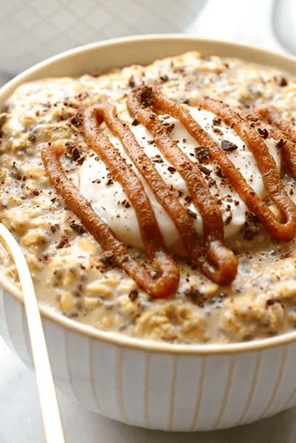 Coffee-infused Overnight Oats with a drizzle of caramel sauce.